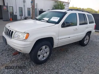 2001 Jeep Grand Cherokee Limited with VIN 1J4GW58N71C506901, listed as a IAAI auction lot 42079198 with Not Provided miles and . Bid and sale history available at DreamBid. Image 2.