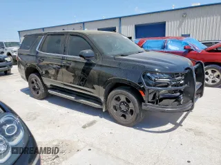 2023 Chevrolet Tahoe Commercial with VIN 1GNSCLEDXPR447042, listed as a Copart auction lot 52399275 with 22,205 mi miles and Salvage title. Bid and sale history available at DreamBid. Image 4.