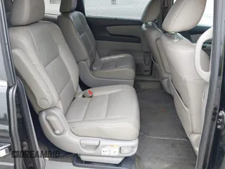 2012 Honda Odyssey EX-L with VIN 5FNRL5H66CB095996, listed as a IAAI auction lot 42446499 with 198,016 mi miles and . Bid and sale history available at DreamBid. Image 8.
