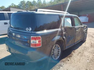 2018 Ford Flex SEL z VIN 2FMGK5C8XJBA17780, wystawiony jako IAAI lot #41600772 z przebiegiem 162 962 mil mil oraz . Historia ofert i sprzedaży dostępna na DreamBid. Obrazek 4.