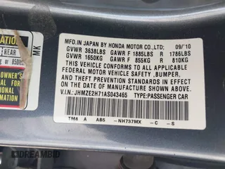 2010 Honda Insight EX with VIN JHMZE2H71AS043465, listed as a IAAI auction lot 42312556 with 151,009 mi miles and . Bid and sale history available at DreamBid. Image 9.