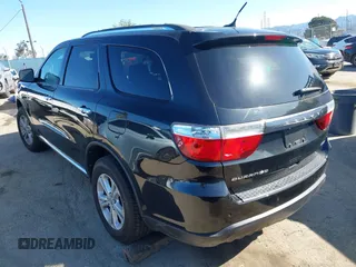 2013 Dodge Durango Crew with VIN 1C4RDHDG1DC666094, listed as a IAAI auction lot 41940121 with 93,131 mi miles and . Bid and sale history available at carsss.com. Image 3.