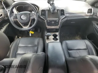 2014 Jeep Grand Cherokee Limited with VIN 1C4RJFBG7EC585151, listed as a Copart auction lot 60458005 with 69,893 mi miles and Salvage title. Bid and sale history available at DreamBid. Image 8.