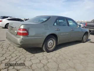 2001 Infiniti Q45 Touring with VIN JNKBY31A01M101364, listed as a Copart auction lot 54859845 with 213,588 mi miles and Salvage Title. Bid and sale history available at DreamBid. Image 3.