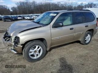 2004 GMC Envoy SLE z VIN 1GKDT13SX42403574, wystawiony jako Copart lot #47813055 z przebiegiem 141 540 mil mil oraz Czysty tytuł • Clean title. Historia ofert i sprzedaży dostępna na DreamBid. Obrazek 1.