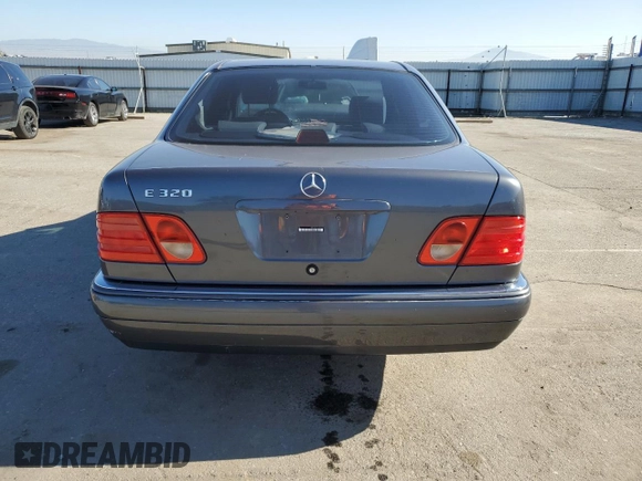 1998 Mercedes-Benz E-Class with VIN WDBJF65F1WA640092, listed as a Copart auction lot 88020155 with 239,622 mi miles and Clean Title. Bid and sale history available at carsss.com. Image 6.