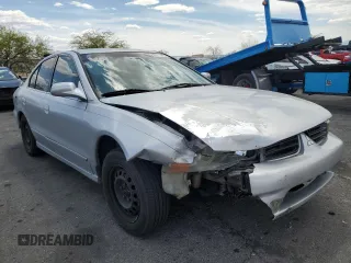 2003 Mitsubishi Galant ES z VIN 4A3AA46G23E104166, wystawiony jako Copart lot #55272055 z przebiegiem 160 653 mil mil oraz Szkoda całkowita • Salvage title. Historia ofert i sprzedaży dostępna na DreamBid. Obrazek 4.