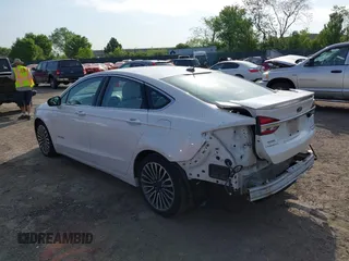 2017 Ford Fusion Hybrid Titanium с VIN 3FA6P0RU7HR148191, выставлен на аукционе IAAI как лот 42167708 с пробегом 72 708 миль миль и . История ставок и продаж доступна на DreamBid. Изображение 3.