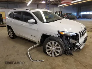 2018 Jeep Cherokee Overland with VIN 1C4PJMJX5JD558242, listed as a Copart auction lot 77577254 with 55,440 mi miles and Salvage Title. Bid and sale history available at carsss.com. Image 4.