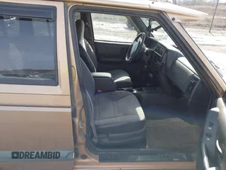1999 Jeep Cherokee Sport with VIN 1J4FF68S1XL540249, listed as a IAAI auction lot 41660594 with 133,995 mi miles and . Bid and sale history available at DreamBid. Image 5.