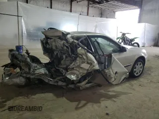 2002 Mazda Protege DX with VIN JM1BJ225021583998, listed as a Copart auction lot 49874135 with Not Provided miles and Non Repairable. Bid and sale history available at DreamBid. Image 3.