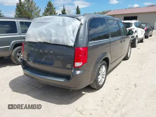 2018 Dodge Grand Caravan SXT z VIN 2C4RDGCG8JR129835, wystawiony jako IAAI lot #42190326 z przebiegiem 81 818 mil mil oraz . Historia ofert i sprzedaży dostępna na DreamBid. Obrazek 4.