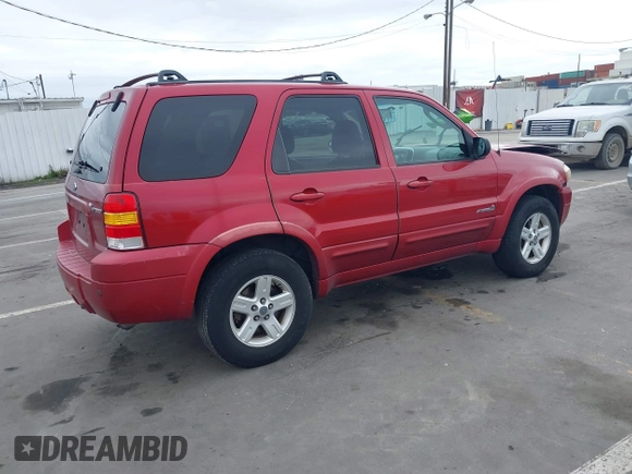 2006 Ford Escape Hybrid with VIN 1FMCU96H96KA52738, listed as a IAAI auction lot 41773608 with 214,834 mi miles and . Bid and sale history available at DreamBid. Image 4.