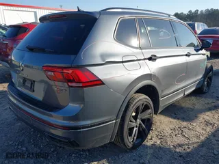 2023 Volkswagen Tiguan SE R-Line Black with VIN 3VV8B7AX3PM014632, listed as a IAAI auction lot 41002858 with 40,955 mi miles. Bid and sale history available at carsss.com. Image 4.