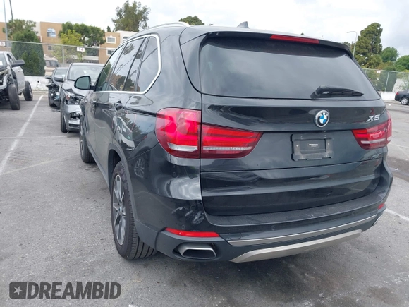 2018 BMW X5 xDrive35i with VIN 5UXKR0C55JL073210, listed as a IAAI auction lot 42047558 with 37,497 mi miles. Bid and sale history available at carsss.com. Image 3.
