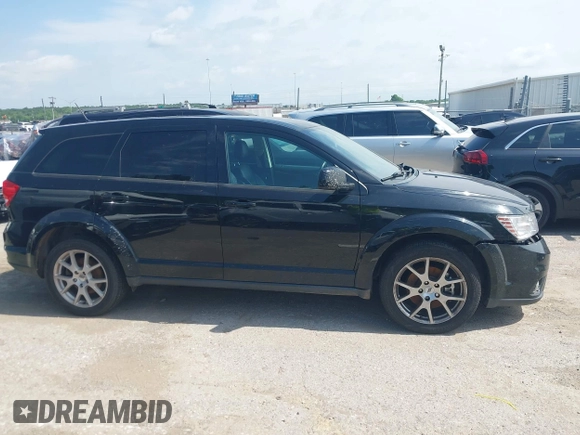 2017 Dodge Journey GT z VIN 3C4PDDEG5HT549451, wystawiony jako IAAI lot #42517485 z przebiegiem 152 438 mil mil oraz . Historia ofert i sprzedaży dostępna na DreamBid. Obrazek 13.