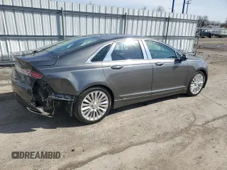 2015 Lincoln MKZ z VIN 3LN6L2JKXFR600669, wystawiony jako Copart lot #51130115 z przebiegiem 75 176 mil mil oraz Szkoda całkowita • Salvage title. Historia ofert i sprzedaży dostępna na DreamBid. Obrazek 3.