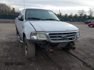 2002 Ford F-150 with VIN 2FTRX17L02CA15425, listed as a IAAI auction lot 41504458 with Not provided miles and . Bid and sale history available at DreamBid. Image 6.