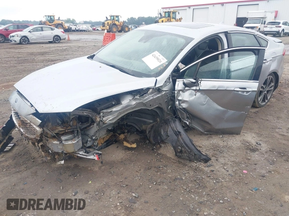 2020 Ford Fusion Titanium with VIN 3FA6P0D99LR138127, listed as a IAAI auction lot 42439024 with 128,792 mi miles and . Bid and sale history available at DreamBid. Image 2.