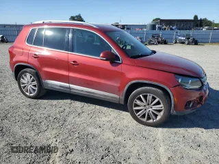 2013 Volkswagen Tiguan SE with VIN WVGBV7AX9DW012368, listed as a Copart auction lot 57244975 with 177,810 mi miles and Salvage title. Bid and sale history available at DreamBid. Image 4.