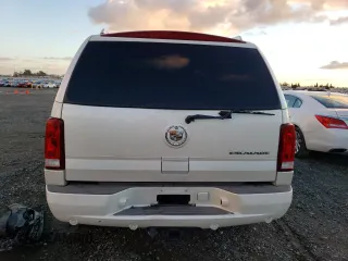 2004 Cadillac Escalade z VIN 1GYEK63N64R200175, wystawiony jako Copart lot #86566364 z przebiegiem Nie podano mil oraz Szkoda całkowita • Salvage title. Historia ofert i sprzedaży dostępna na DreamBid. Obrazek 6.