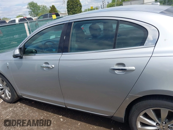 2013 Lincoln MKS with VIN 1LNHL9DK6DG600685, listed as a IAAI auction lot 42171998 with 165,933 mi miles and . Bid and sale history available at DreamBid. Image 14.