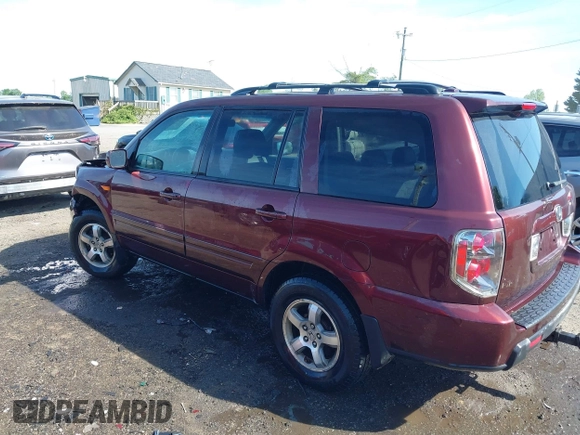 2007 Honda Pilot EX-L with VIN 5FNYF18547B006094, listed as a IAAI auction lot 42297719 with 235,632 mi miles and . Bid and sale history available at DreamBid. Image 3.
