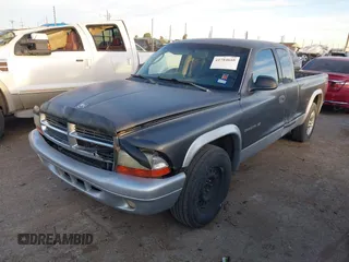 2002 Dodge Dakota SLT with VIN 1B7GL42X42S682184, listed as a IAAI auction lot 41784688 with 168,298 mi miles. Bid and sale history available at carsss.com. Image 2.