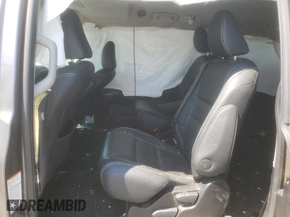 2016 Toyota Sienna SE with VIN 5TDXK3DC9GS724520, listed as a Copart auction lot 51005185 with 88,074 mi miles and Salvage title. Bid and sale history available at DreamBid. Image 11.