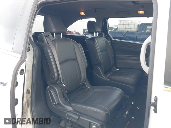2022 Honda Odyssey Touring with VIN 5FNRL6H8XNB057293, listed as a IAAI auction lot 41826014 with 30,454 mi miles and . Bid and sale history available at DreamBid. Image 8.