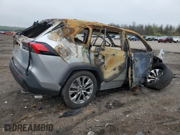 2023 Toyota RAV4 XLE Premium with VIN JTMA1RFV7PJ041903, listed as a Copart auction lot 56928875 with Not provided miles and Salvage title. Bid and sale history available at DreamBid. Image 3.