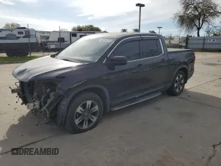 2017 Honda Ridgeline RTL-T with VIN 5FPYK2F6XHB008194, listed as a Copart auction lot 49764775 with 137,563 mi miles and Salvage title. Bid and sale history available at DreamBid. Image 1.