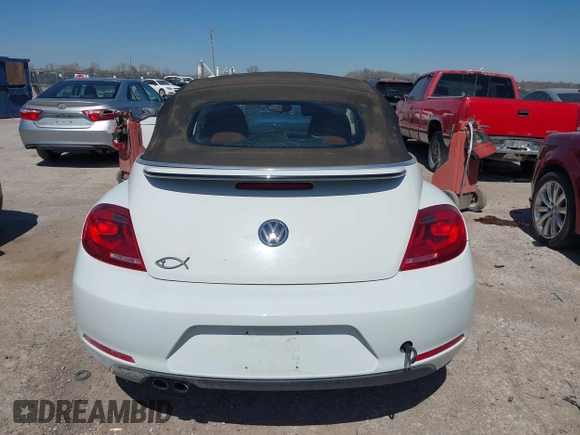 2015 Volkswagen Beetle 1.8T w/Tech with VIN 3VW517AT9FM810122, listed as a IAAI auction lot 41815980 with 72,420 mi miles and . Bid and sale history available at DreamBid. Image 16.