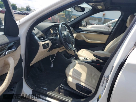 2017 BMW X1 xDrive28i with VIN WBXHT3Z3XH4A55624, listed as a Copart auction lot 59773545 with 140,251 mi miles and Salvage title. Bid and sale history available at DreamBid. Image 7.