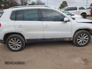 2017 Volkswagen Tiguan Wolfsburg Edition with VIN WVGRV7AX5HK019734, listed as a IAAI auction lot 41391911 with 123,005 mi miles and . Bid and sale history available at DreamBid. Image 13.