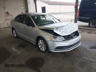 2015 Volkswagen Jetta SE z VIN 3VWD17AJ6FM314785, wystawiony jako IAAI lot #42159509 z przebiegiem 78 415 mil mil oraz . Historia ofert i sprzedaży dostępna na DreamBid. Obrazek 1.