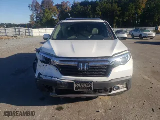 2020 Honda Ridgeline RTL-E with VIN 5FPYK3F77LB002473, listed as a Copart auction lot 77117414 with 62,631 mi miles and Salvage Title. Bid and sale history available at carsss.com. Image 5.
