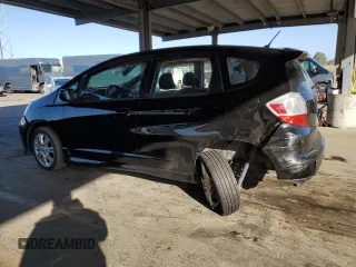 2010 Honda Fit Sport with VIN JHMGE8H46AS027813, listed as a Copart auction lot 52589035 with 212,672 mi miles and Salvage Title. Bid and sale history available at carsss.com. Image 2.