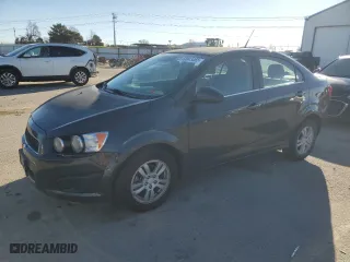 2014 Chevrolet Sonic LT with VIN 1G1JC5SG4E4159776, listed as a Copart auction lot 50043465 with 98,245 mi miles and Salvage Title. Bid and sale history available at carsss.com. Image 1.