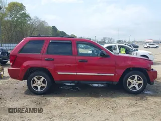 2005 Jeep Grand Cherokee Laredo with VIN 1J4HS48N95C711992, listed as a IAAI auction lot 41944696 with 209,299 mi miles and . Bid and sale history available at DreamBid. Image 13.