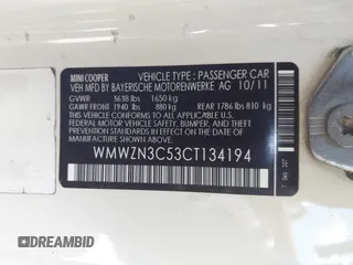2012 MINI Convertible z VIN WMWZN3C53CT134194, wystawiony jako IAAI lot #42261686 z przebiegiem 104 099 mil mil oraz . Historia ofert i sprzedaży dostępna na DreamBid. Obrazek 9.