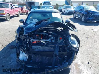 2024 MINI Hardtop 2 Door Cooper SE with VIN WMW13DJ03R2V25523, listed as a IAAI auction lot 41585964 with 7,690 mi miles. Bid and sale history available at carsss.com. Image 6.