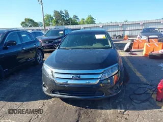 2012 Ford Fusion SE z VIN 3FAHP0HA5CR347636, wystawiony jako IAAI lot #42184462 z przebiegiem 211 804 mil mil oraz . Historia ofert i sprzedaży dostępna na DreamBid. Obrazek 12.