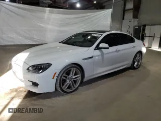 2015 BMW 6 Series 650i xDrive with VIN WBA6B4C56FD761374, listed as a Copart auction lot 41599334 with 63,057 mi miles and Salvage Title. Bid and sale history available at carsss.com. Image 1.