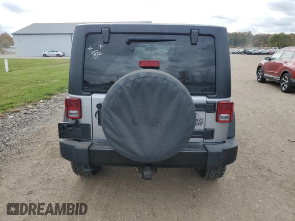 2018 Jeep Wrangler JK Unlimited Sport S with VIN 1C4BJWDG2JL908286, listed as a Copart auction lot 77313844 with 69,497 mi miles and Salvage Title. Bid and sale history available at carsss.com. Image 6.