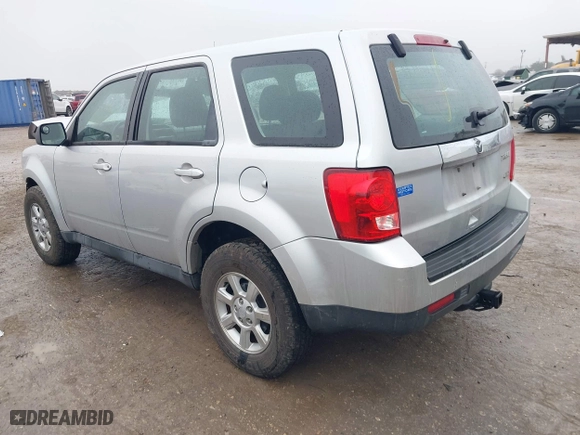 2011 Mazda Tribute Sport with VIN 4F2CY9C7XBKM01050, listed as a IAAI auction lot 41433870 with 122,287 mi miles. Bid and sale history available at carsss.com. Image 3.