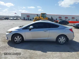 2012 Honda Civic Cpe LX with VIN 2HGFG3B52CH549698, listed as a IAAI auction lot 41818647 with 100,975 mi miles. Bid and sale history available at carsss.com. Image 14.