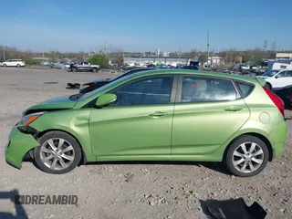 2014 Hyundai Accent SE z VIN KMHCU5AEXEU175389, wystawiony jako IAAI lot #42067176 z przebiegiem 124 741 mil mil oraz . Historia ofert i sprzedaży dostępna na DreamBid. Obrazek 14.