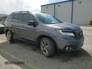 2020 Honda Passport Touring z VIN 5FNYF8H9XLB007336, wystawiony jako Copart lot #51012975 z przebiegiem 74 620 mil mil oraz Szkoda całkowita • Salvage title. Historia ofert i sprzedaży dostępna na DreamBid. Obrazek 14.