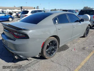 2018 Dodge Charger Daytona with VIN 2C3CDXCT0JH337673, listed as a IAAI auction lot 41244351 with 96,738 mi miles. Bid and sale history available at carsss.com. Image 4.